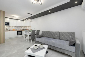 Modern Apartment With Private Garden Międzywodzie by Renters Prestige in Miedzywodzie